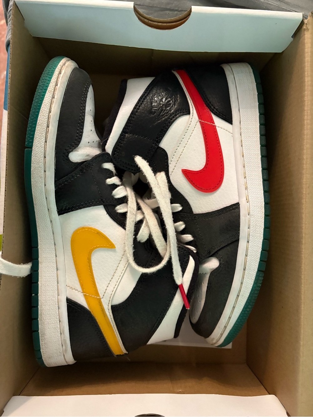 Jordan 1 Mid Alternate swooshes red yellow